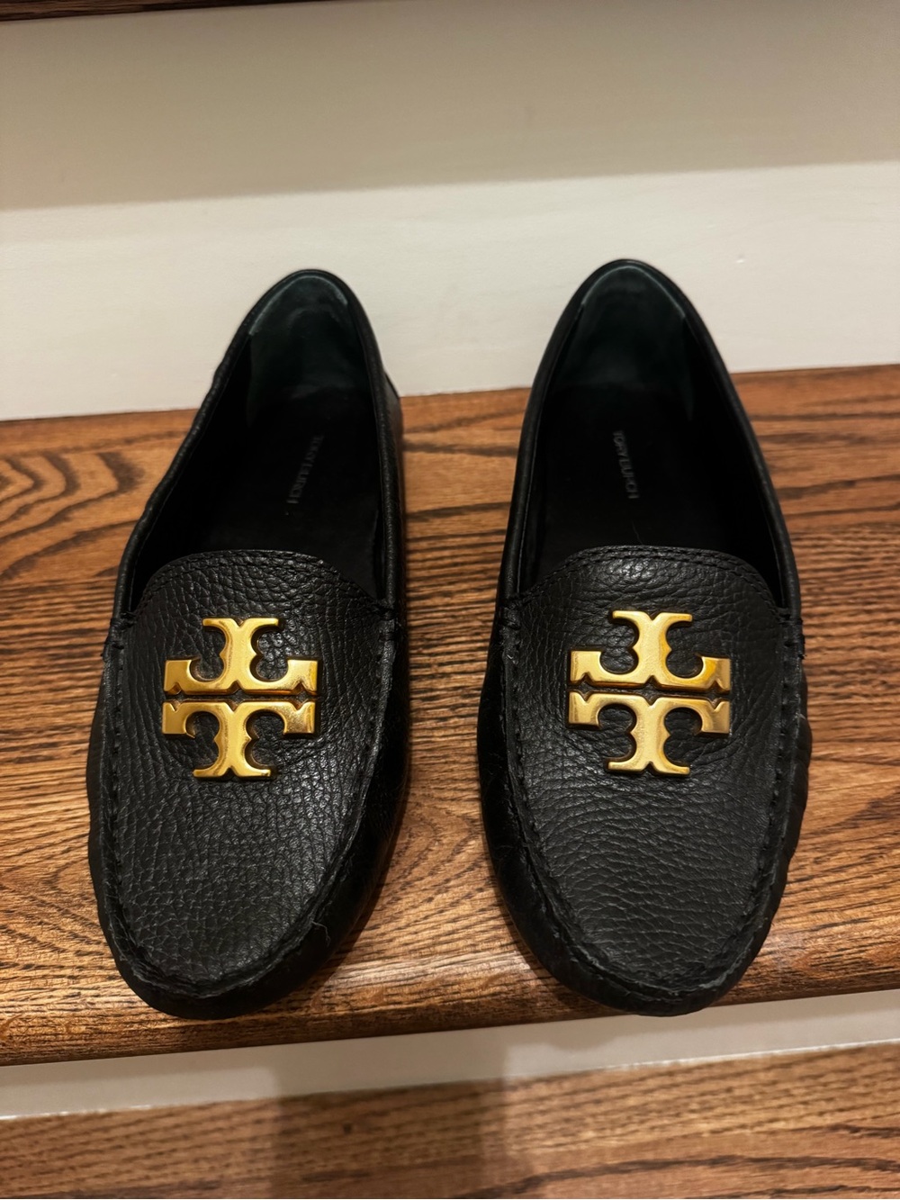 Like New Tory Burch Black Leather Loafers with Gold Logo Plaques